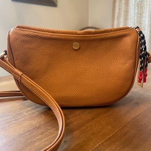 New “Besha” brand shoulder purse in light brown/yellow tone.